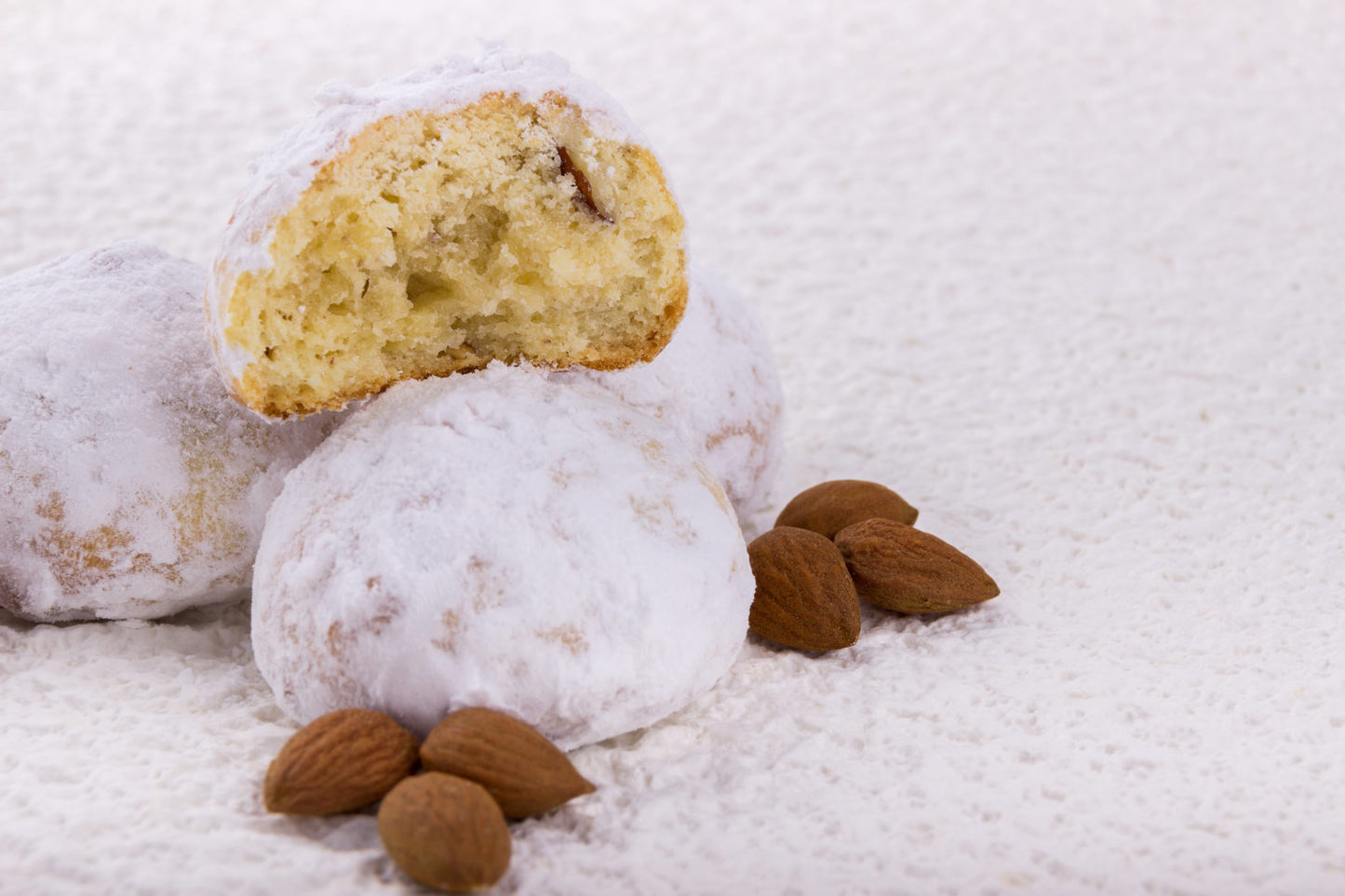 Kourabiedes (Kourabie) Authentic Handmade Artisan Holiday Almond Sugar Cookies. Imported from Thessaloniki, Greece with Whole Almond Center by Papadopoulos Loukoumi.